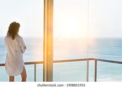 Photo of attractive woman enjoying balcony view at home