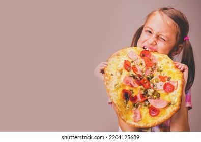 Photo Of Attractive Young Beautiful Girl Eats Big Slice Of Pizza. Copy Space.