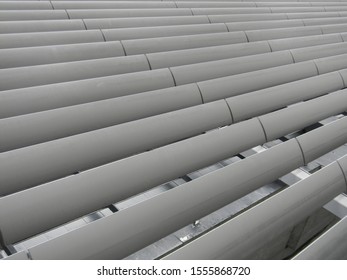 Photo of a background with metal parallel structures
