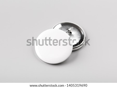 Photo of badge. Template for branding identity. For graphic designers presentations and portfolios. Badge Mock-up isolated on gray background. Photo mock up.