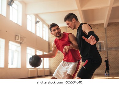 Photo Of Basketball Teammates Warming Up On The Court.