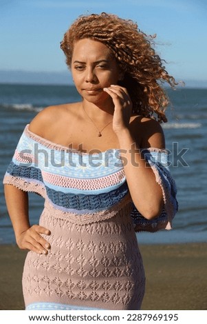 Photo of beautiful Brazilian lady on the beach