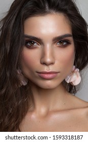 Photo Of A Beautiful Brunette Girl With Hazel Eyes And Square Jaw And Chin. Perfect Skin, Light Professional Make Up.