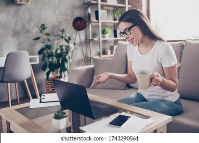 Photo Of Beautiful Business Lady Stay Home Quarantine Talk Skype Online Interview Good Mood Asking Job Candidate Questions Drink Fresh Coffee Friendly Hr Sit Sofa Living Room Indoors