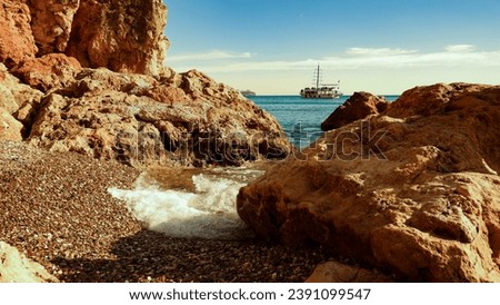 photo of a beautiful coast, landscape of the sea with a ship