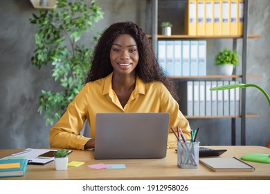 Photo Of Beautiful Dark Skin Businesswoman Team Leader Sit Behind Desk Laptop Take Interview Indoors In Office