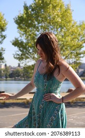 Photo Of A Beautiful White Girl In A Beautiful Dress, Near Graffitti