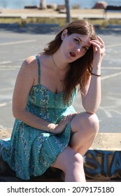 Photo Of A Beautiful White Girl In A Beautiful Dress, Near Graffitti