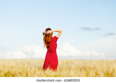photo of beautiful young woman on the wonderful wheat field background - Shutterstock ID 626803055