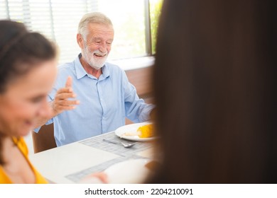 Photo Of Big Family At Home, People Sit Feast Dishes Table Around Roasted Turkey Multi-generation Relatives Making Group With Food And Pizza In House Living Room Indoors