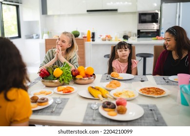 Photo Of Big Family At Home, People Sit Feast Dishes Table Around Roasted Turkey Multi-generation Relatives Making Group With Food And Pizza In House Living Room Indoors