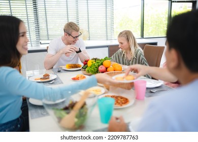 Photo Of Big Family At Home, People Sit Feast Dishes Table Around Roasted Turkey Multi-generation Relatives Making Group With Food And Pizza In House Living Room Indoors