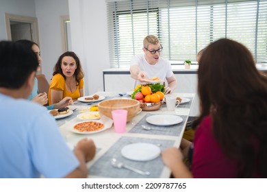 Photo Of Big Family At Home, People Sit Feast Dishes Table Around Roasted Turkey Multi-generation Relatives Making Group With Food And Pizza In House Living Room Indoors