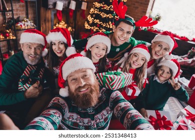 Photo of big full family take selfie hold presents celebrate christmas festive time apartment indoors - Powered by Shutterstock