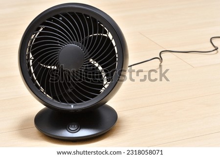 Photo of black air circulator