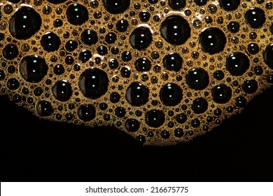 A Photo Of Black Coffee With Bubble,close Up Shot