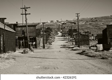 Photo Of A Black And White Old Ghost Town. Old Wild Western Gold Rush Town Vintage B&W America. Wild West Depression In The Old Days. Historical B&W From Bodie.