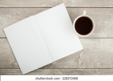 Photo Blank. Open Book,  Brochure On A Wooden Table And Coffee 