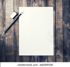 Photo Of Blank Stationery: Letterhead, Pencil And Eraser On Vintage Wooden Table Background. Responsive Design Mockup For Placing Your Design. Top View.