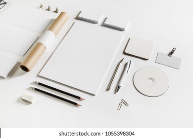 Photo of blank stationery set on white paper background. Corporate identity mockup. Responsive design template.