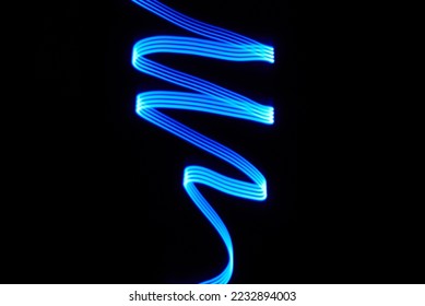 Photo of blue line spiral in the dark