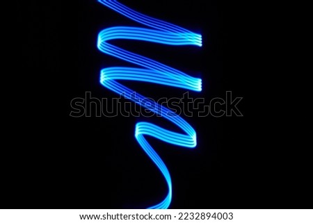 Photo of blue line spiral in the dark