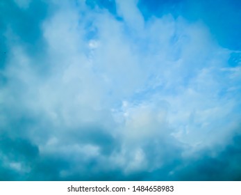 Photo of blue sky surrounded by dramatic clouds during daytime - Shutterstock ID 1484658983