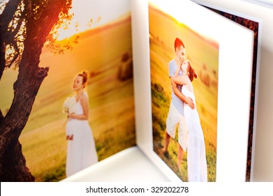 Photo Book Of Young Couple, Pregnancy And Expectation.