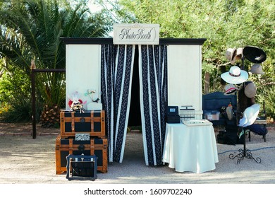 photo booth with masks for wedding event