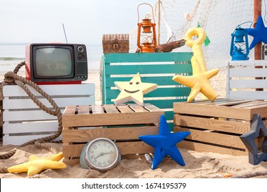 Photo Booth Setup On Beach. Summer, Surfing And Fishing Theme For An Event Party Or Birthday. 