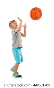 Photo Of Boy Throwing Basketball Over White Background