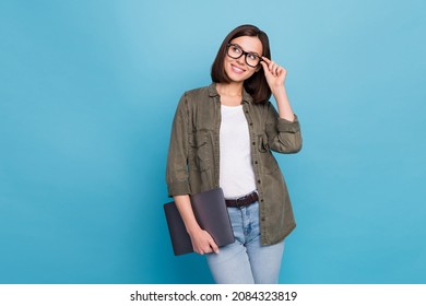 Photo of brainstorming clever manager banker lady touch specs look empty space hold netbook isolated over blue color background - Shutterstock ID 2084323819