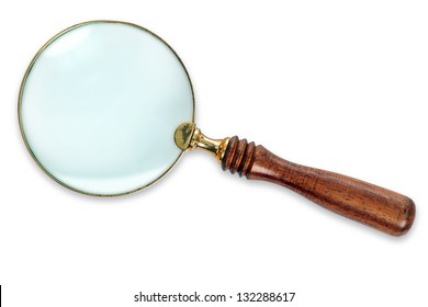 Photo of a Brass Magnifying Glass with wooden handle, isolated on white background with clipping path for both the outline and internal glass area.