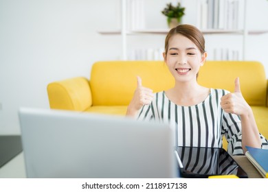 A Photo Of A Bright Asian Business Woman Working At Home In The Room. The Idea Is Work Form Home Finance Marketing Bright Portrait Simple