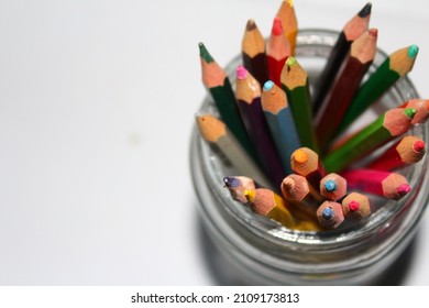 Photo Of A Bunch Of Colored Pencils On A White Background, Suitable For Powerpoint Background