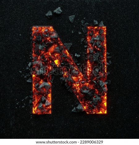 A photo of a burning capital letter N on a black background is made of hot coals.