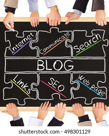 Photo Of Business Hands Holding Blackboard And Writing BLOG Concept