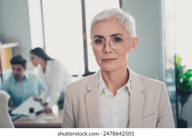 Photo of business lady looking confident in modern office - Powered by Shutterstock