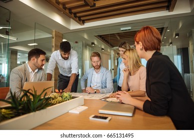 Photo Of Business People Working Together On A New Project As A Team In The Office.