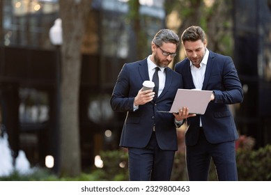 photo of businessmen trading online, banner. two businessmen trading online. - Powered by Shutterstock