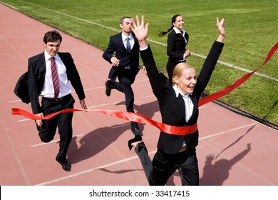 Photo Of Businesspeople Crossing The Finish Line