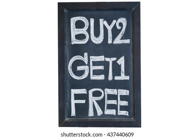 Photo of Buy 2 get 1 free chalkboard sign on white background.