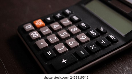 photo of calculator digits in the office - Powered by Shutterstock