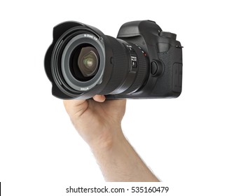 Photo Camera In Hand Isolated On White Background