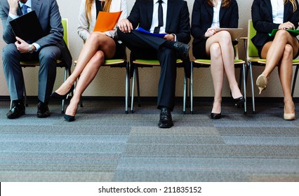 Photo of candidates waiting for a job interview - Shutterstock ID 211835152