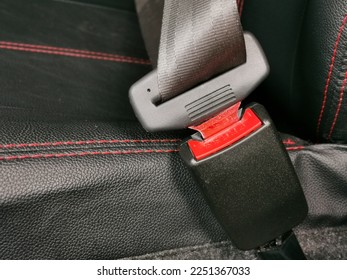 Photo of car seat belt lock. - Shutterstock ID 2251367033