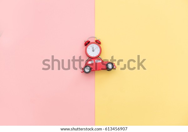 photo of car shaped toy and alarm clock on\
the wonderful background in pop art\
style