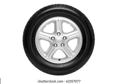 Photo Of A Car Tyre (tire) On A Five Spoke Alloy Wheel Isolated On A White Background With Clipping Path.