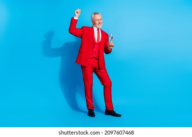 Photo Of Carefree Funky Man Hold Champagne Golden Wine Dance Wear Red Tux Shoes Isolated Blue Color Background