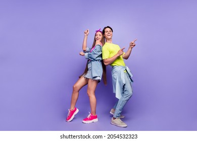 Photo Of Carefree Funny Couple Dance Disco Retro Event Empty Space Wear Pin-up Outfit Isolated Violet Color Background